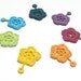Rainbow crochet flowers / garland or greetings tag / bright colors / shiny cotton