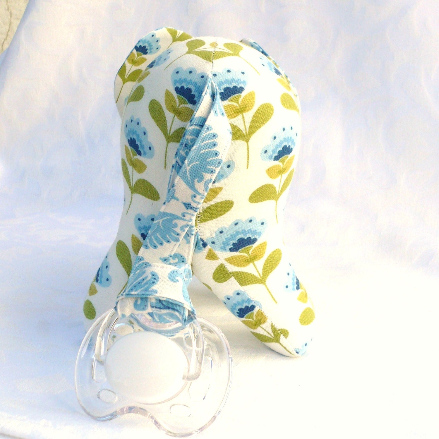 Elephant toy with pacifier tail and sound, blue and white. Made to order.