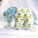 Elephant toy with pacifier tail and sound, blue and white. Made to order.