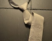 Silver grey necktie with lace fabric