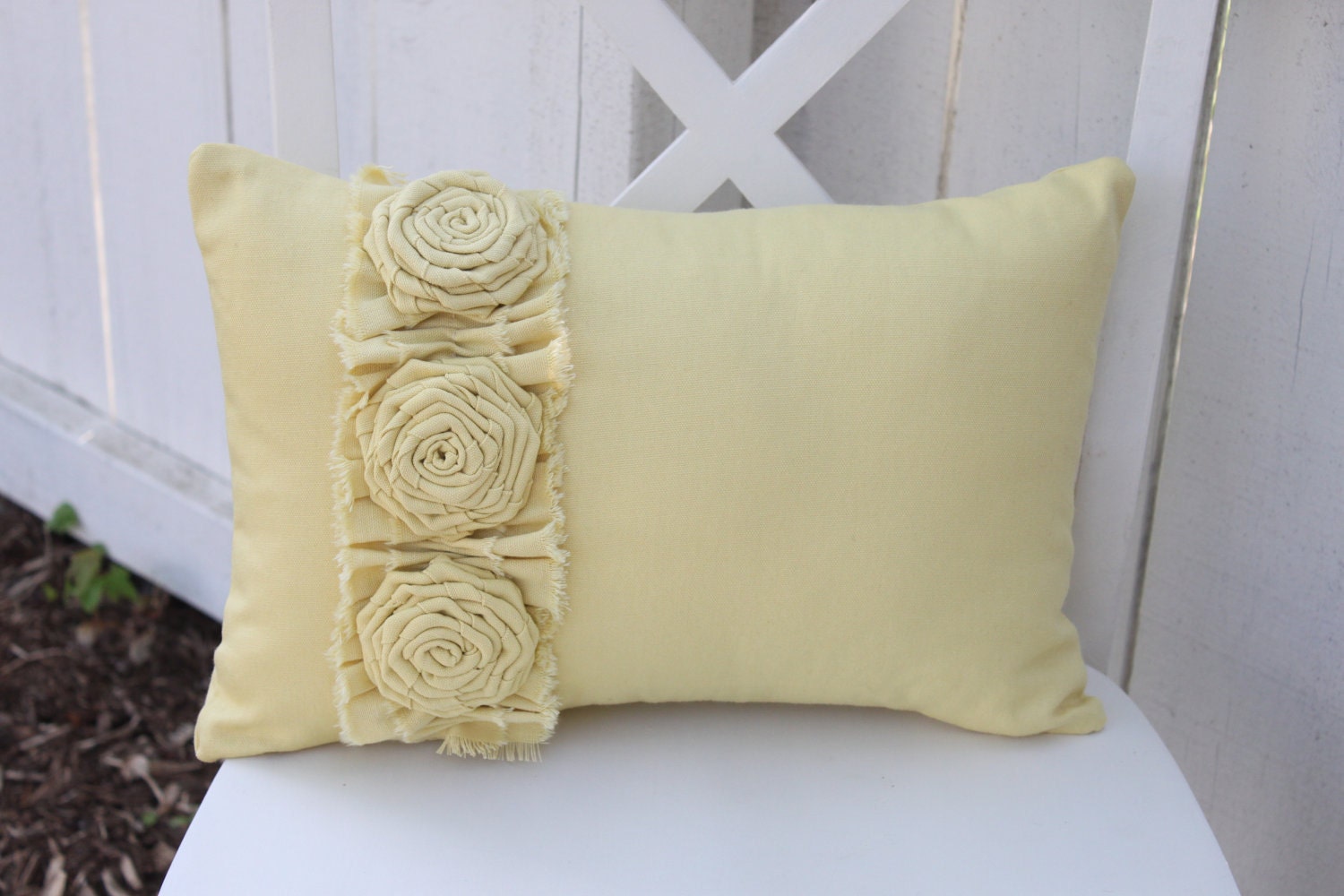 Yellow Pillow with Frayed Ruffles and Three Roses