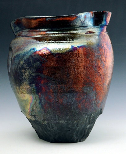 raku vase, copper luster carved and altered