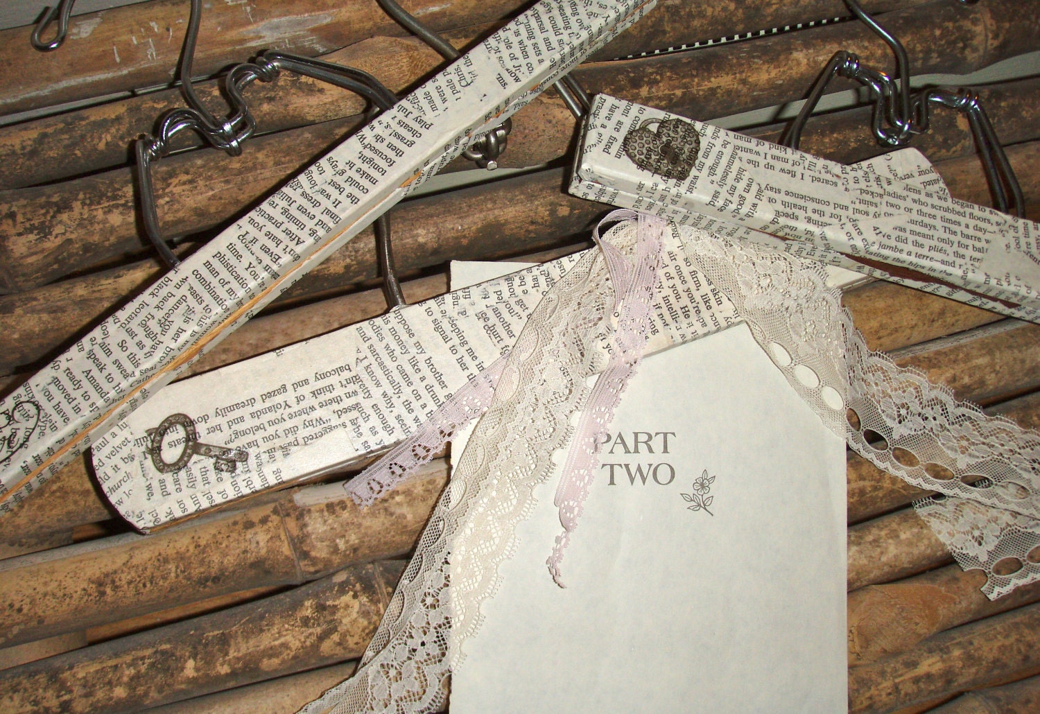 Vintage wooden hangers covered in book pages skeleton key lock love design ribbon handmade