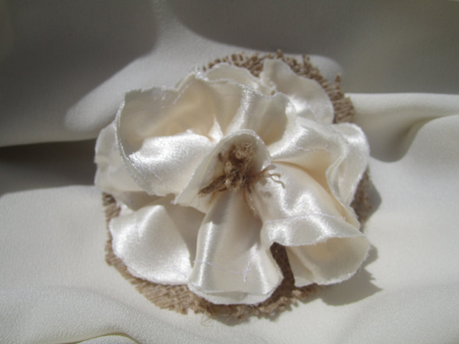 Beautiful burlap flower satin hair accessory in a soft and lovely crepe back satin fabric