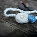 Single Keepsake Garter with blue raw silk and ivory silk organza rosettes