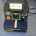 Wow-Polaroid Black Rainbow with Electric Flash- If your looking for a Polaroid Camera see our Entire selection.