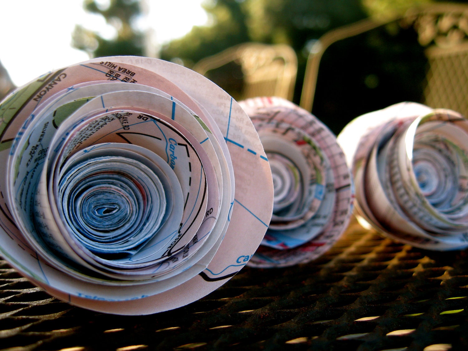 5 extra-small circular rolled map flowers: home decor, wedding, gift topper, craft supply, scrapbooking, holiday
