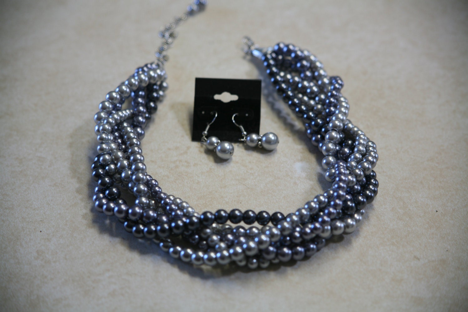 Gray cluster strand necklace with free earrings