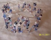 Silver, Wire wrapped bracelet, handmade, purples, blues, shimmering white, mountain sunset colors