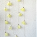 Daffodils, blossom garland, wedding decoration, garden party, spring décor, yellow