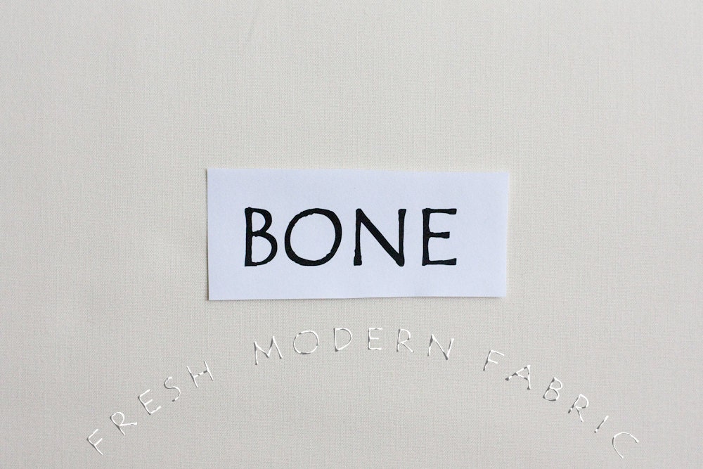 One Yard Bone Kona Cotton Solid Fabric from Robert Kaufman