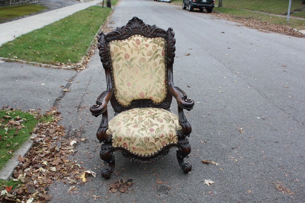 Antiqe oak ornate carved arm chair