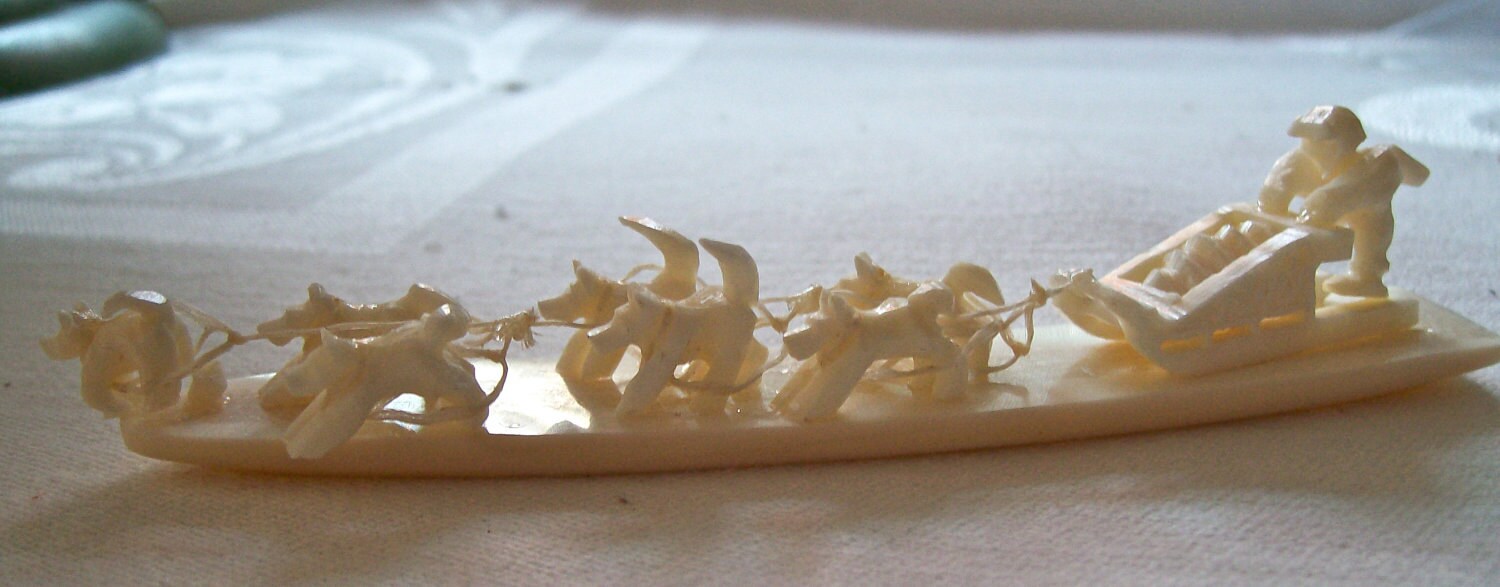 Hand Carved ivory Alaskan Dog Sled Miniatures by LynnsLavishLoot