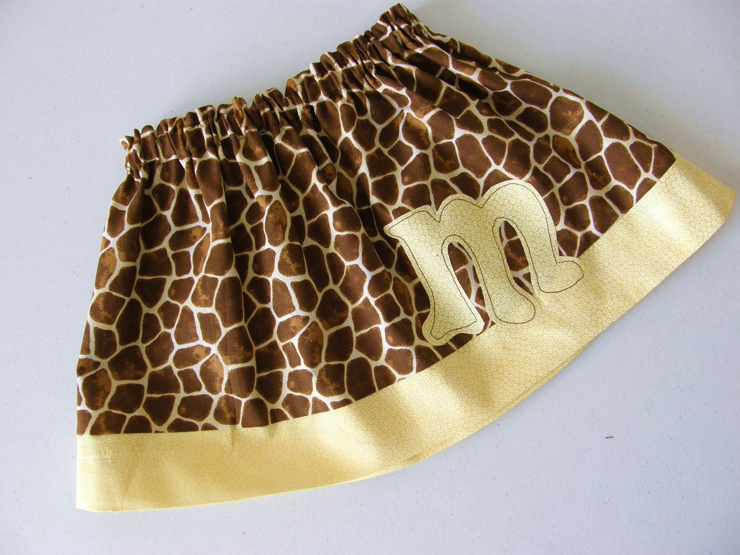 Brown and yellow giraffe skirt with sunshine yellow border personalize with name for tweens, baby and girls in sizes NB - 16