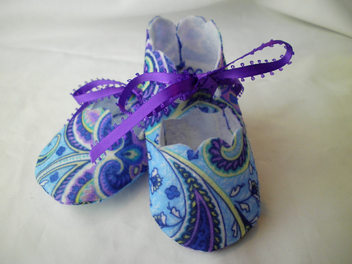 Blue and purple paisley baby booties newborn to 3 months
