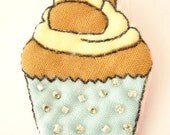 Beaded, quilted fairy cake brooch