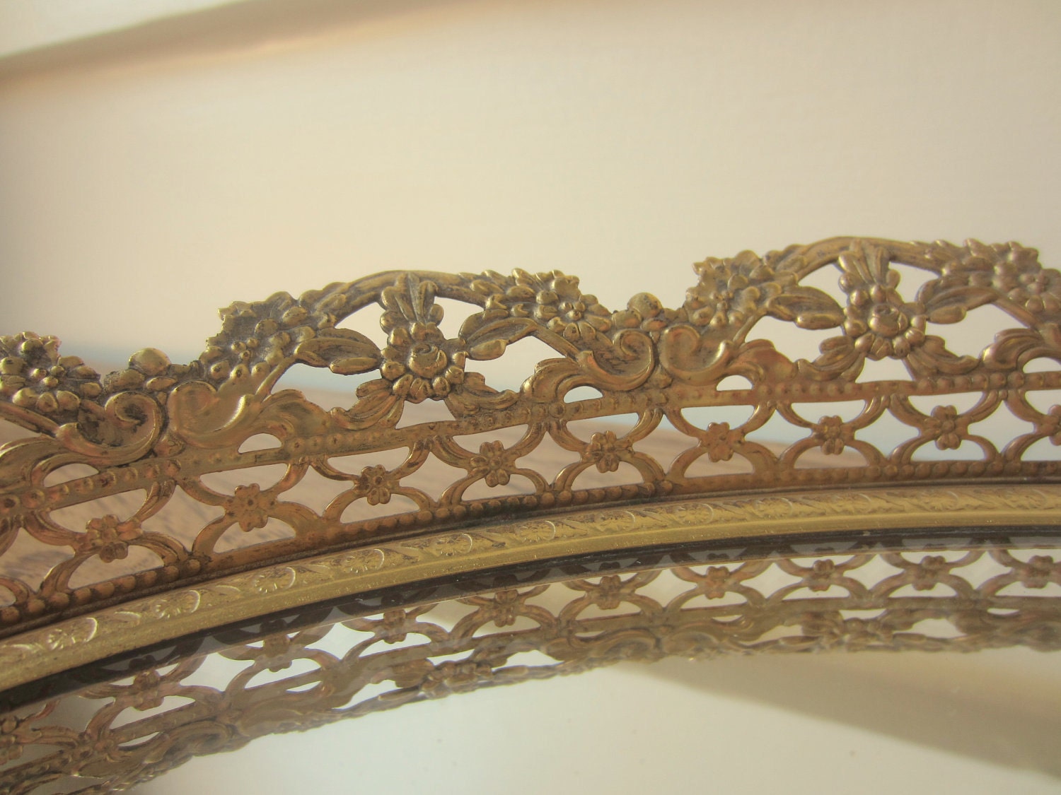 Vintage gold oval mirror dresser caddy.  Gold filigree dresser mirror.