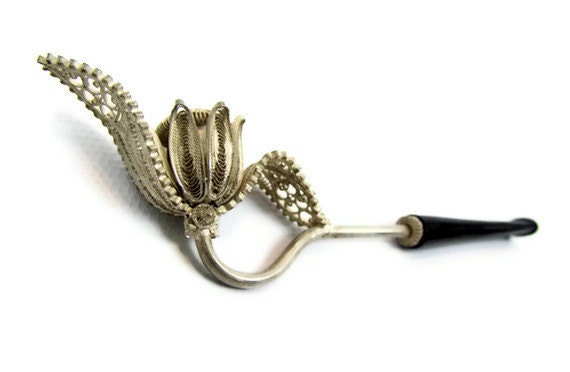 Antique opium or hash pipe, intricate silver design with black tip very Lost Generation