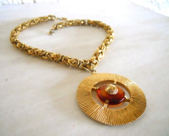 Vintage Gold tone 1960's amulet necklace with faux  tortoise shell disk statement costume jewelry necklace