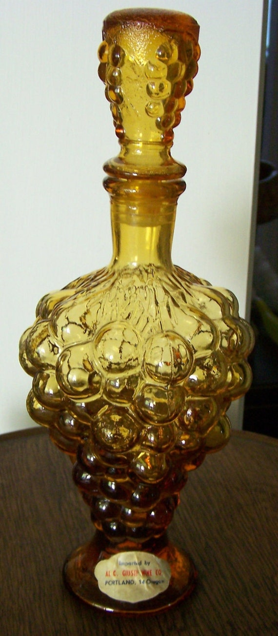 1960s amber glass grape shape wine bottle by GirtGirlsGoodies