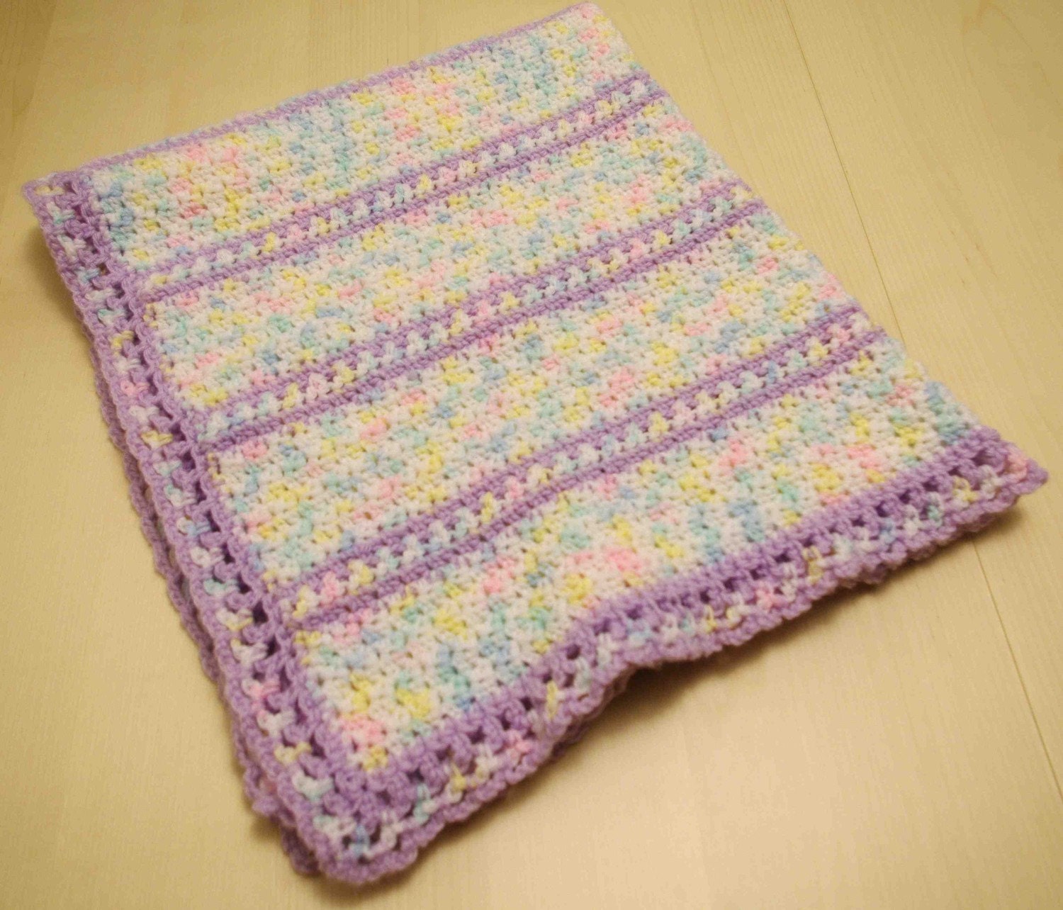 Lilac and colour baby afghan
