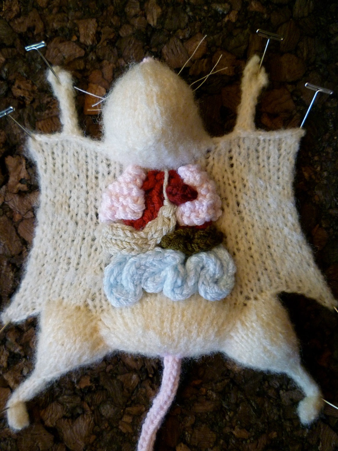 VEGAN Knitted Lab Rat, dark cork background