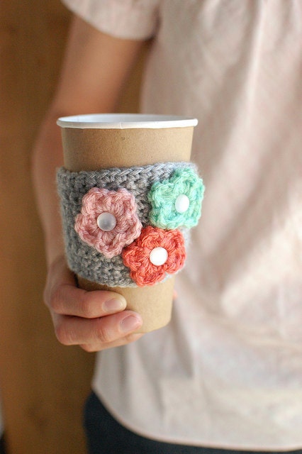 Coffee cozy with multi-colored flowers SPRINGPDX by The Cozy Project