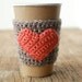 Natural coffee cup cozy with pumpkin colored heart by The Cozy Project