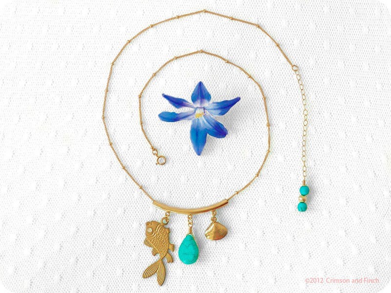 Turquoise gold charm necklace "Oceans Away" fish, shell, summer