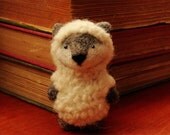 Needle felted wolf in sheep's clothing