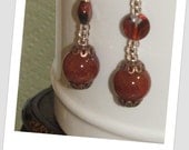 Amber and multifaceted glass dangle earrings