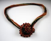 Beadweaving: Black, Gold, Pumpkin Striped Herringbone Rope with Beaded Toggle Clasp