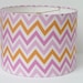 Small Drum Lamp Shade in a Pink and Orange Chevron / Zigzag Fabric.