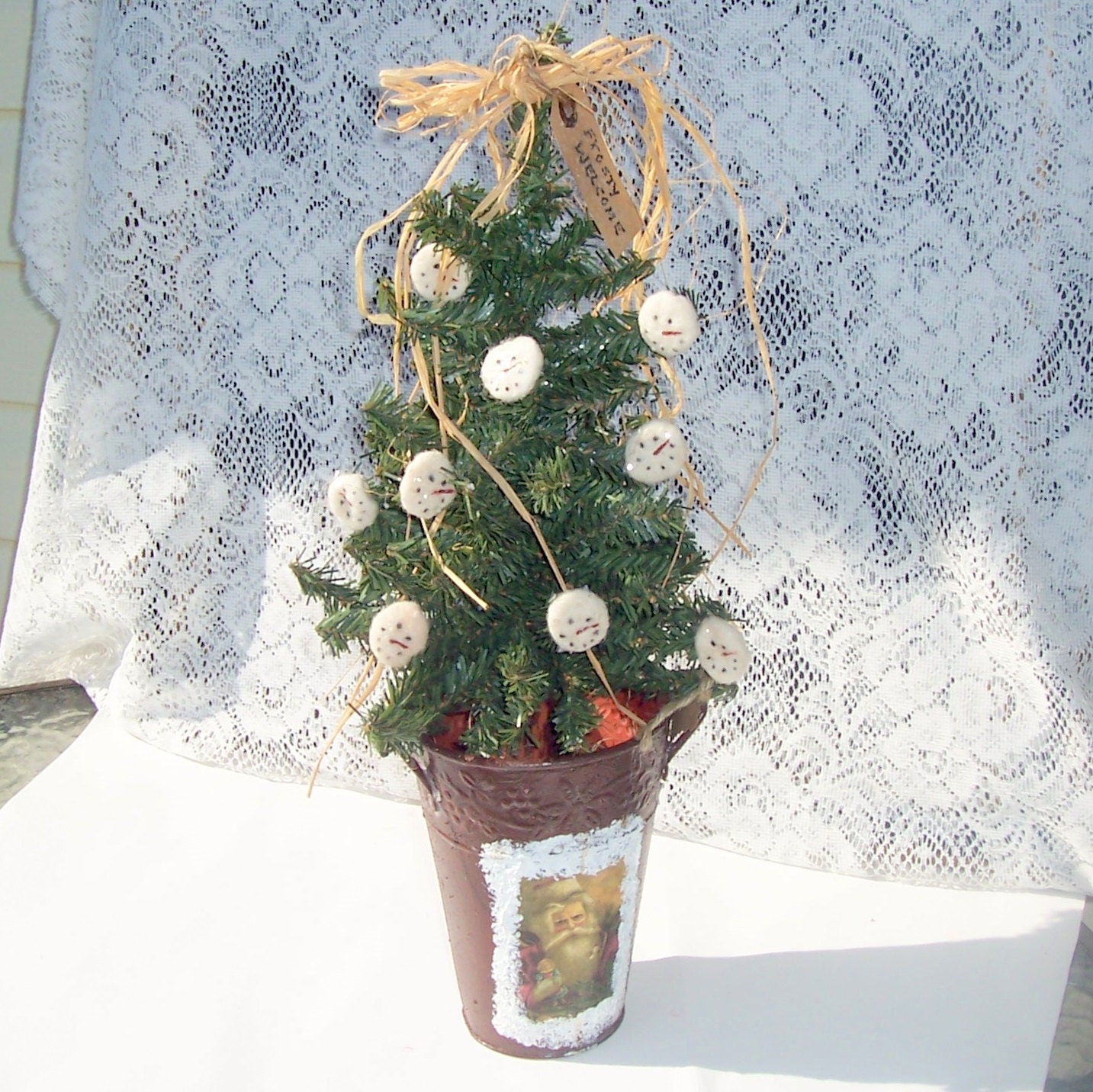 Decorated Christmas tree snowman rusty look bucket Santa decor snowman buttons raffia topper
