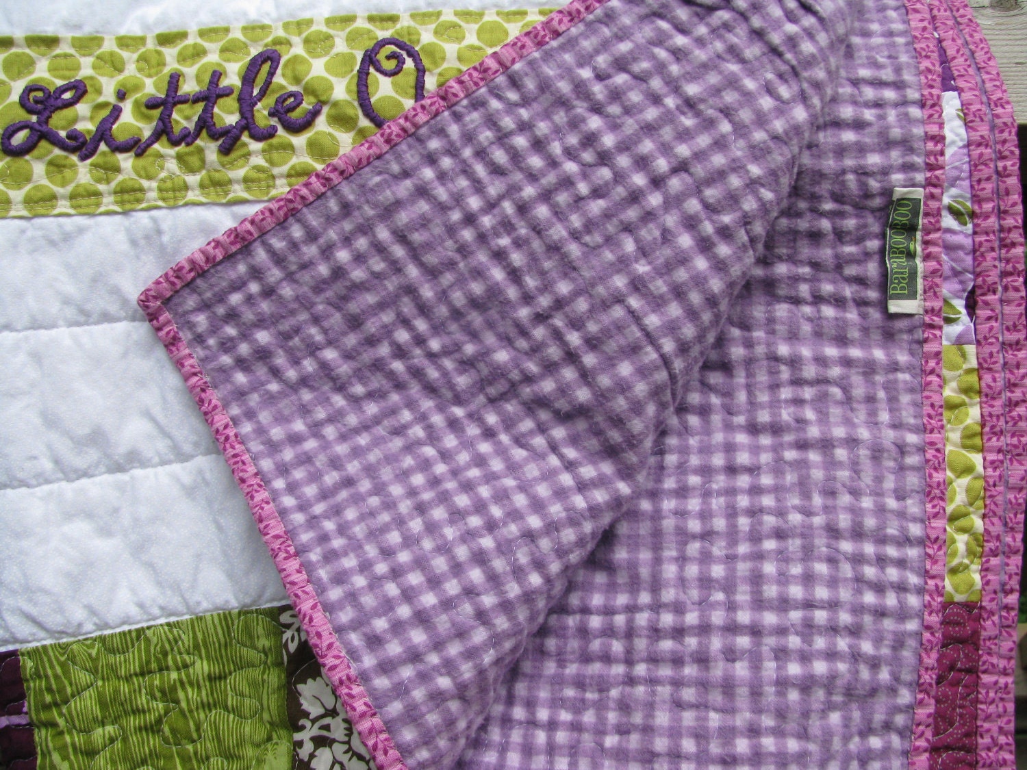 Woodland Owl baby quilt of flannel and cotton in earthy sage green, chocolate brown, deep eggplant/purple  with tree branch