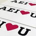 AEI love U. Black & magenta screenprint 8.3 x 11.7 (A4)