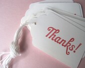 Set of 10 stamped tags with string -- "thanks"