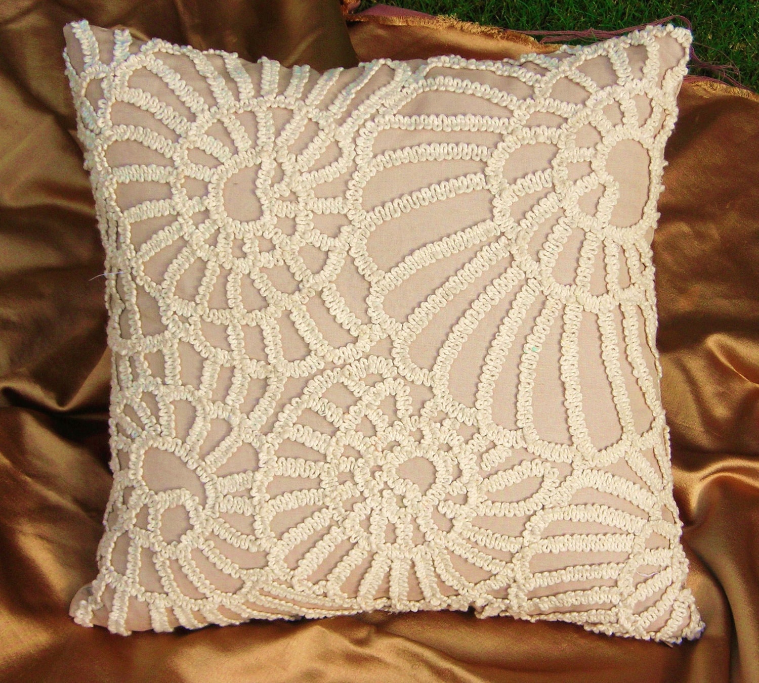 Snail Geometry Cushion,16 x 16 inches,beige linen embroidered using soft cotton yarn twisted to form a snail inspired pattern