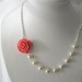 Asymmetrical Rose necklace . Coral Resin Rose . Silver Chain