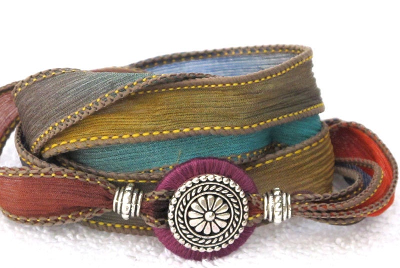 Silk Ribbon Whirly Wrap Bracelet southwest colors of sand turquoise sunset and gold with silver focal piece refined elegant desert colors