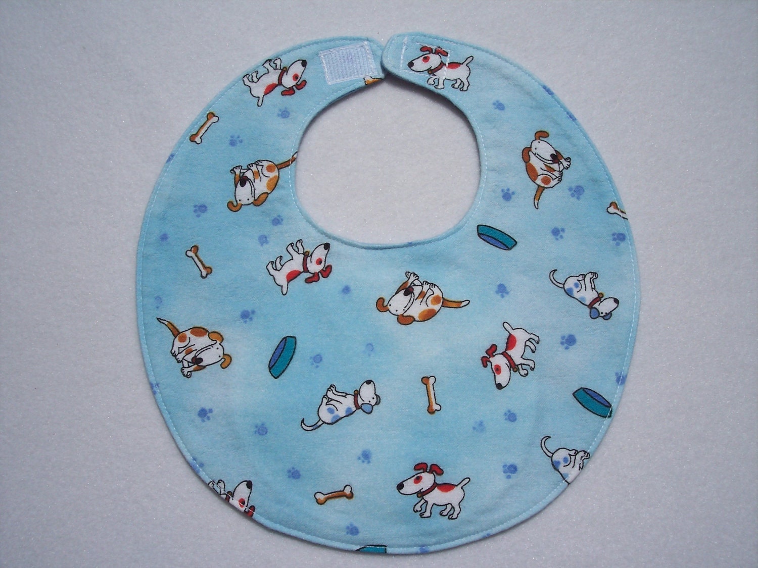 Baby Bibs, four soft layers, reversible, blue with cute doggies