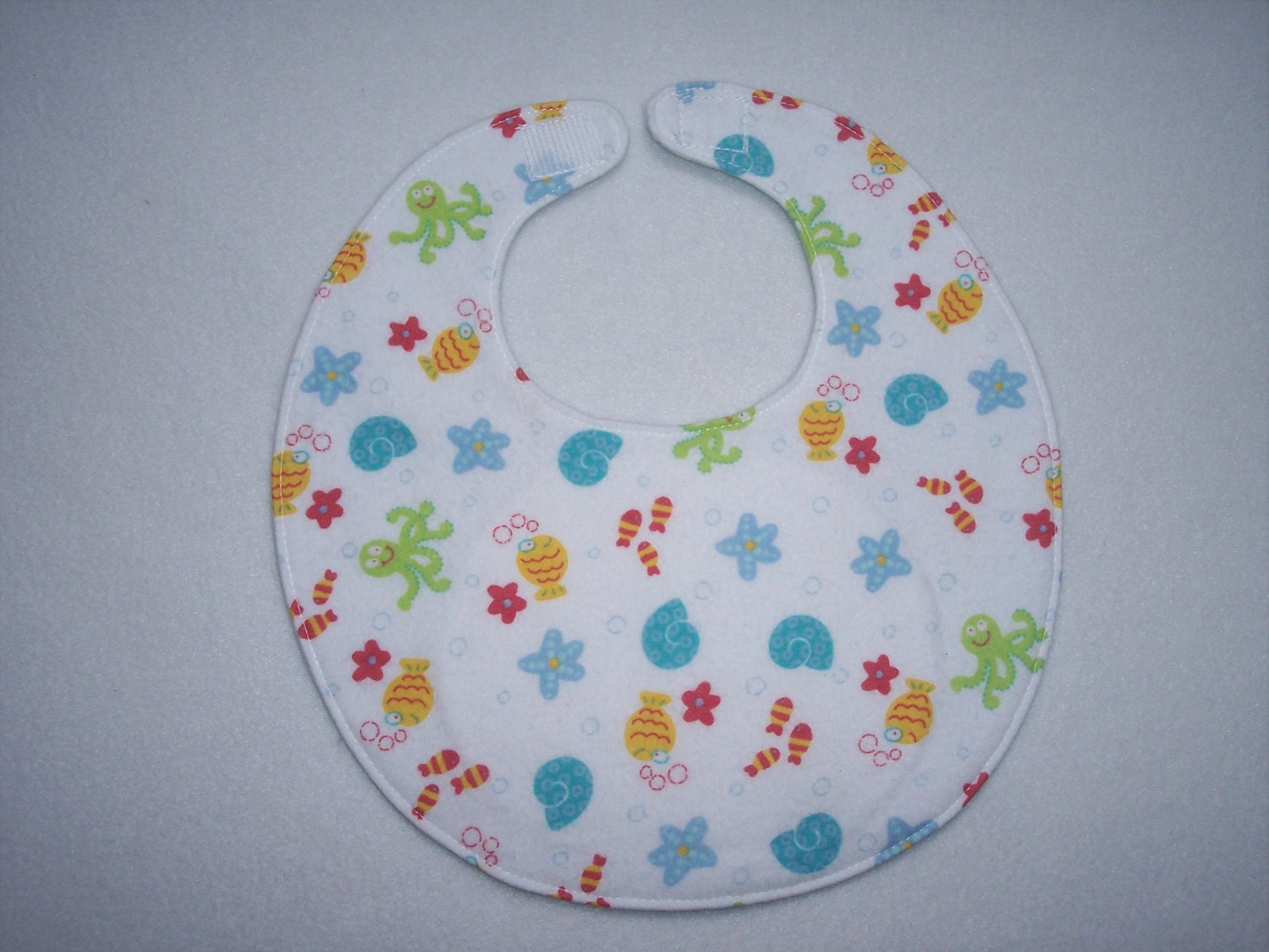 Baby Bib, four soft layers, reversible, at the beach