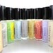 10 Assorted Roll On Perfume Oils - Great for the Perfume Addict / Party Favors