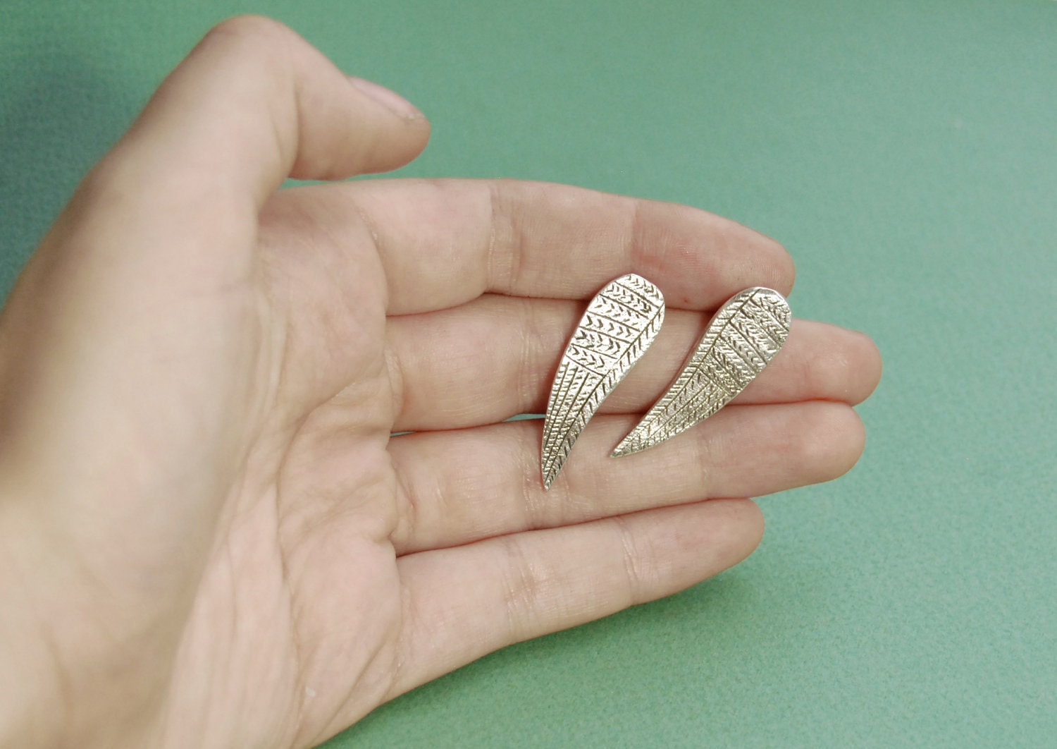 Silver wing earrings
