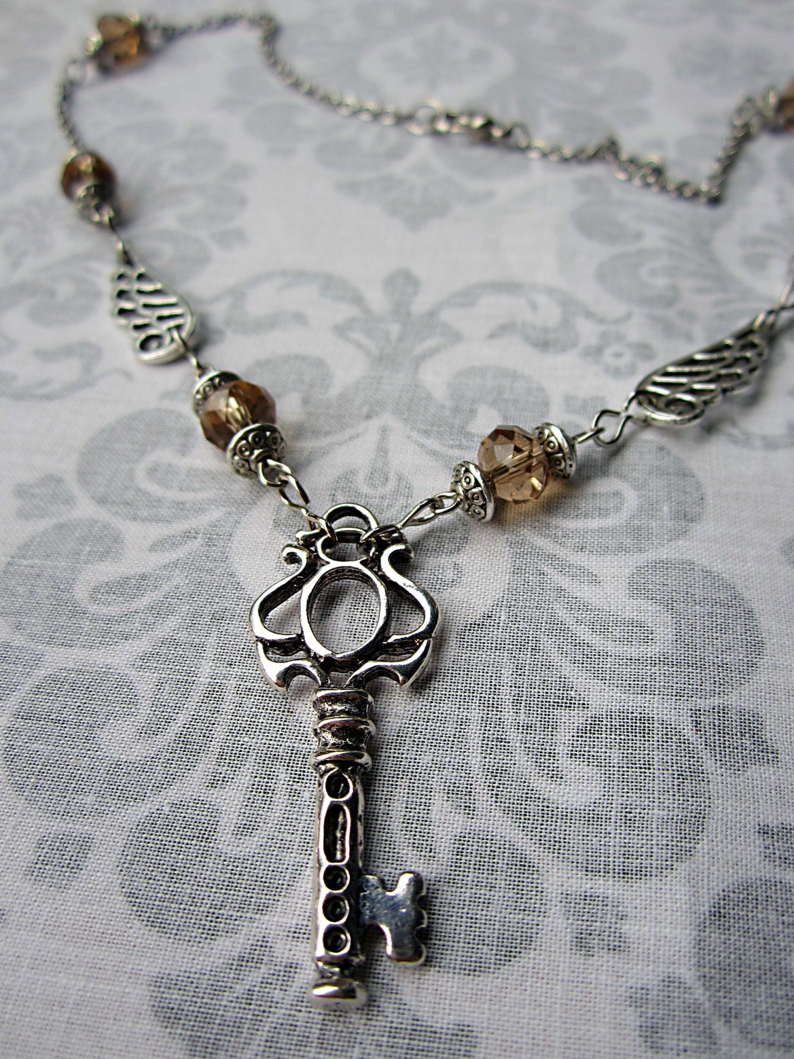 Winged Key  in Champagne and Silver