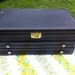 Vintage jewelry box. Large. Black with gold detailing. Red velvet interior.