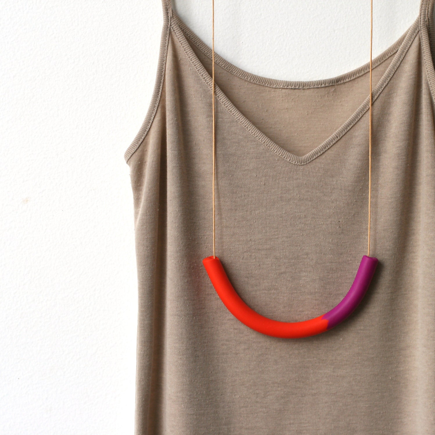 not quite a semi circle makes a necklace
