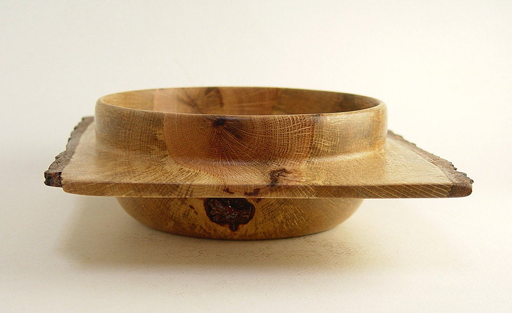 Saturn Bowl turned from Salvaged Black Oak. 10.25" Length by 2" Tall.