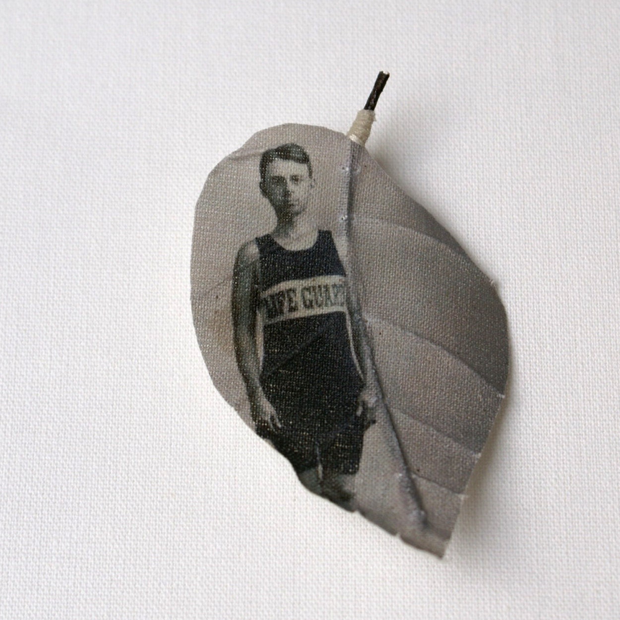 Alangium leaf brooch printed with vintage photograph 'Life guard'