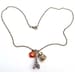 Antiqued Brass Eiffel Tower Carrousel Flower Necklace